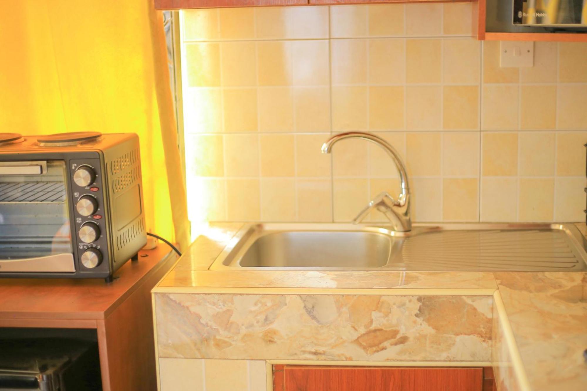 Rustic Gardens Bed & Breakfast Kitunzi Lungujja คัมพาลา ภายนอก รูปภาพ